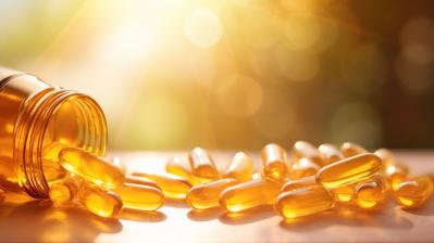 Fish oil capsules on white background