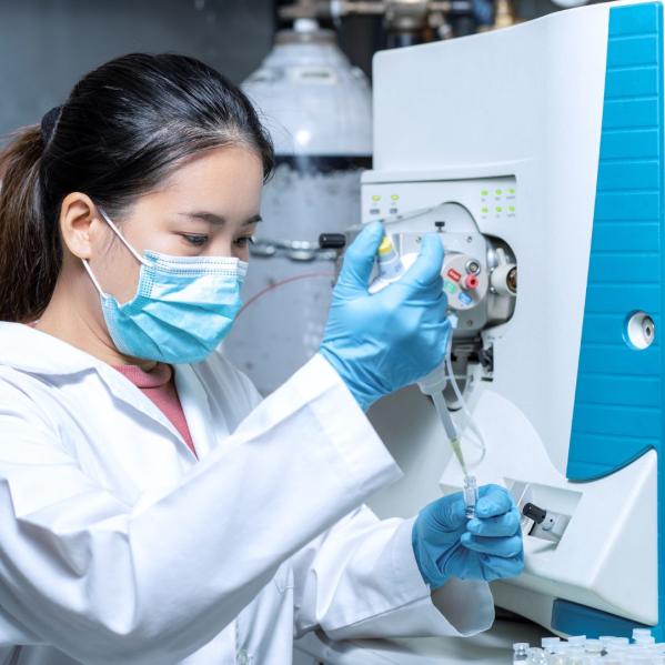 lab tech using equipment